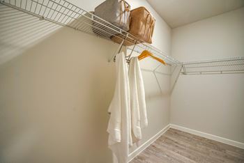 a bedroom with a medium sized bed and a ceiling fan